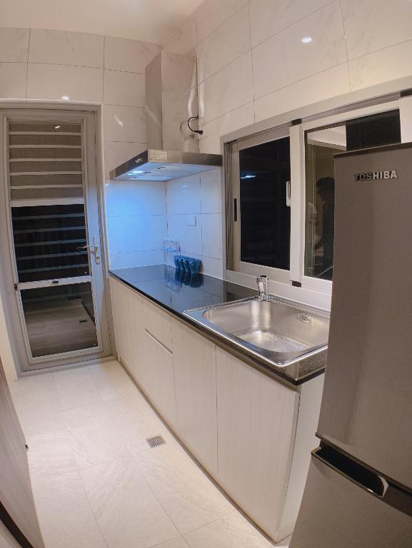 Kuchyň nebo kuchyňský kout v ubytování 駐駐逢甲 Shine Residence