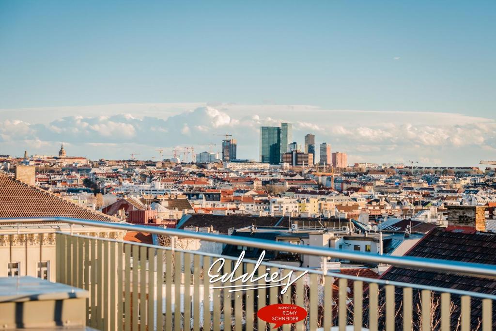 a view of a city from a balcony at Eddie’s Design Apartments in Vienna
