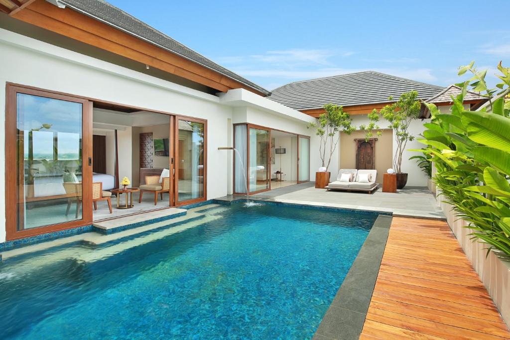 an image of a swimming pool in a villa at Royal Suites at The Bandha in Legian