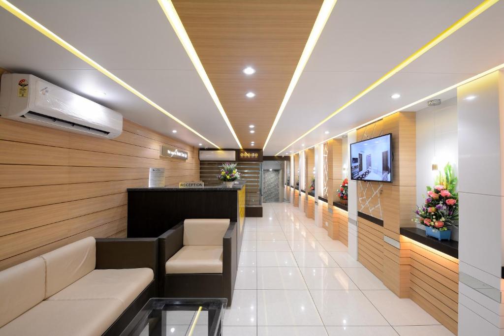 TV a/nebo společenská místnost v ubytování Hotel One Up