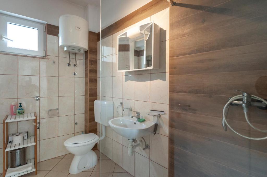 Koupelna v ubytování Apartments Pepi
