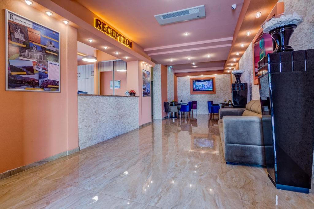 TV a/nebo společenská místnost v ubytování Adriatik Lux Apartments