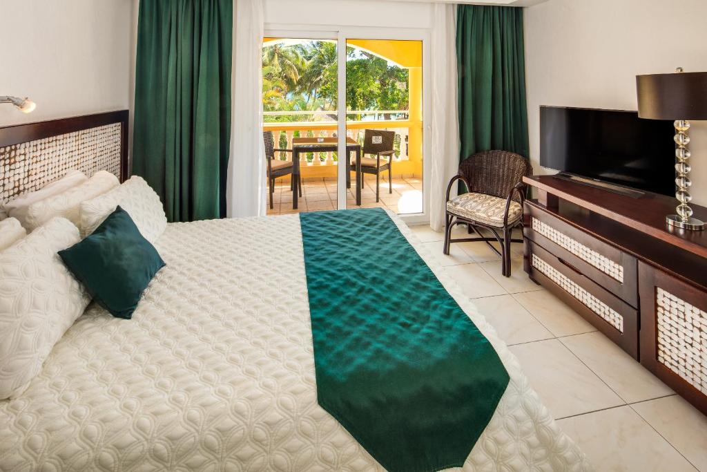 TV a/nebo společenská místnost v ubytování Hotel Villa Taina