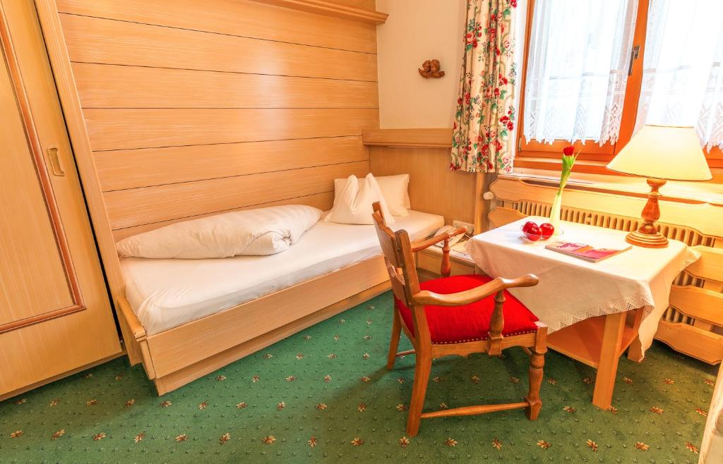 Postel nebo postele na pokoji v ubytování Hotel Antonius