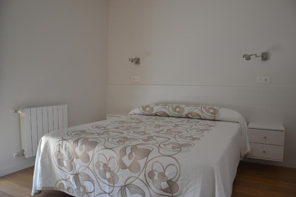 Postel nebo postele na pokoji v ubytování Costa Quebrada Apartamentos