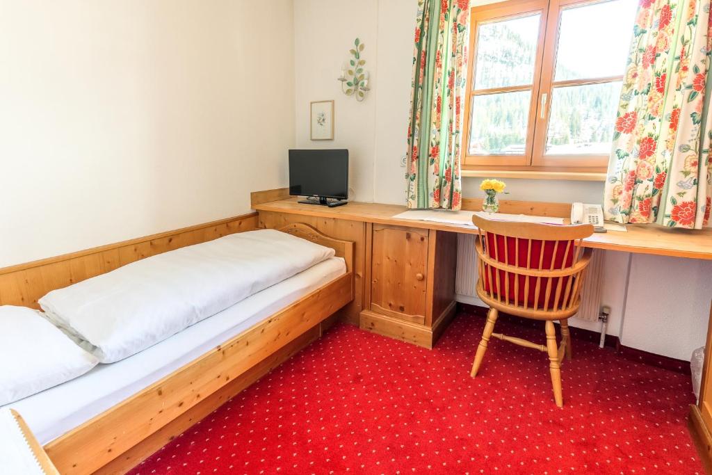 TV a/nebo společenská místnost v ubytování Hotel Antonius