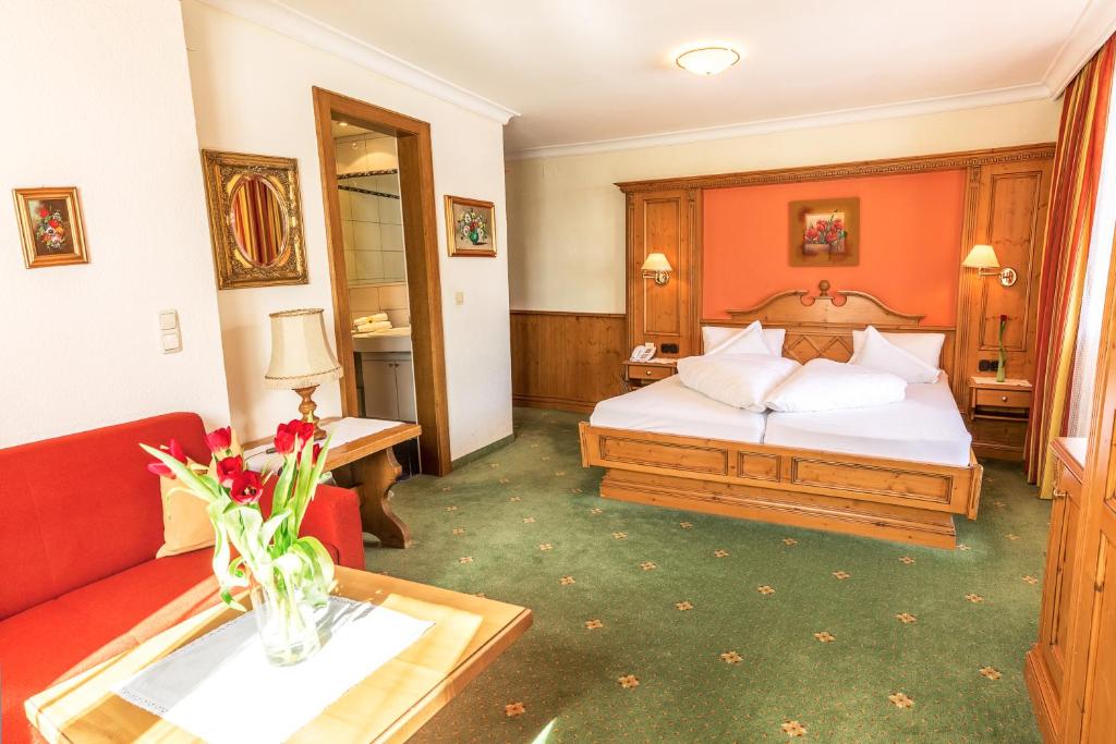Postel nebo postele na pokoji v ubytování Hotel Antonius