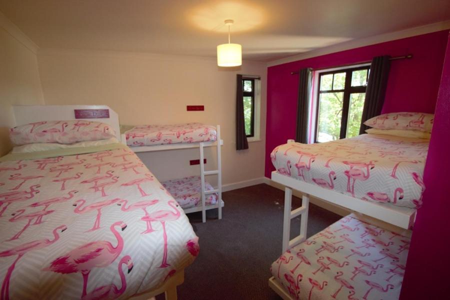 Postel nebo postele na pokoji v ubytování Inverness Student Hotel