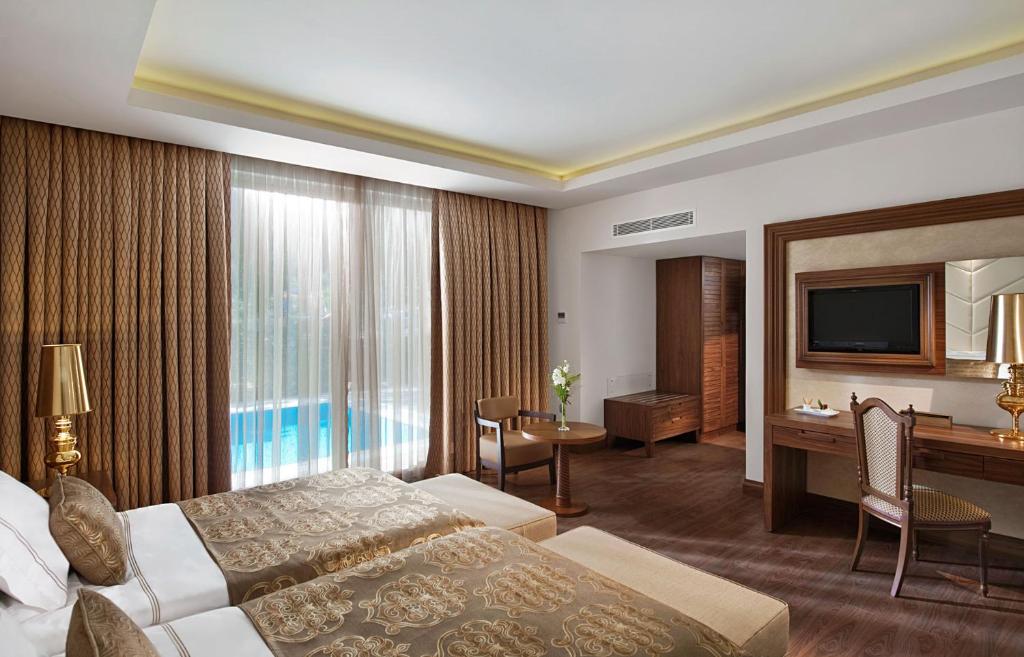Postel nebo postele na pokoji v ubytování Akka Antedon Hotel - Premium Ultra All Inclusive