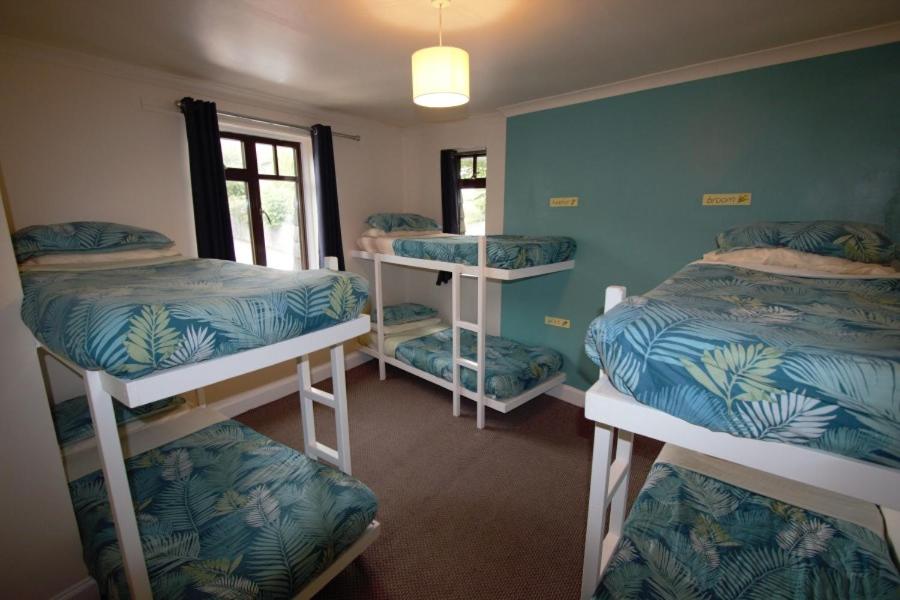 Postel nebo postele na pokoji v ubytování Inverness Student Hotel