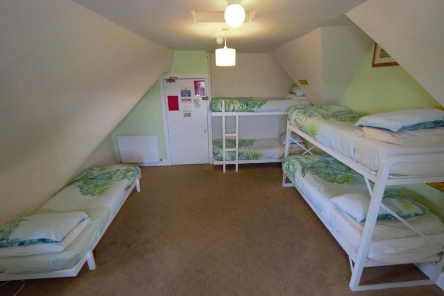 Postel nebo postele na pokoji v ubytování Inverness Student Hotel