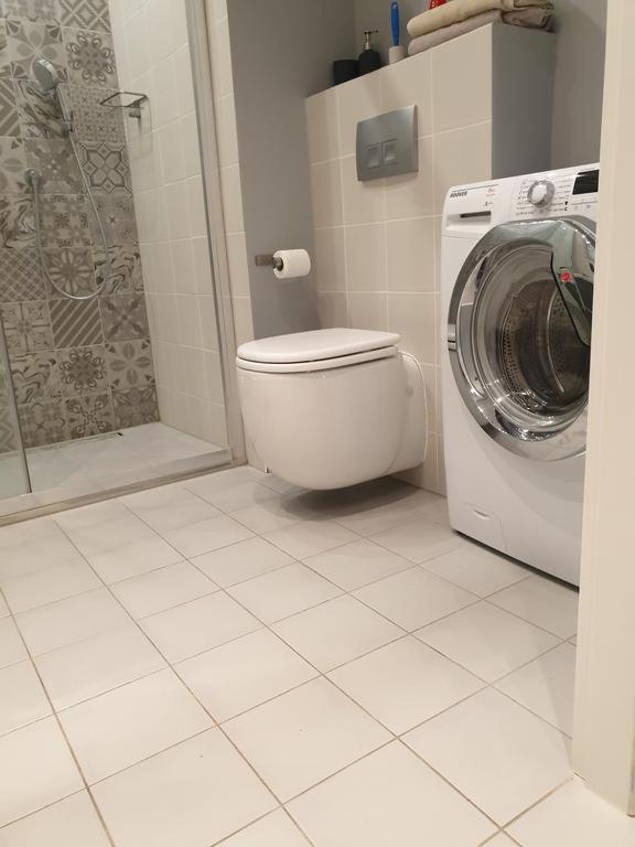 Kúpeľňa v ubytovaní Apartamenty Promenada