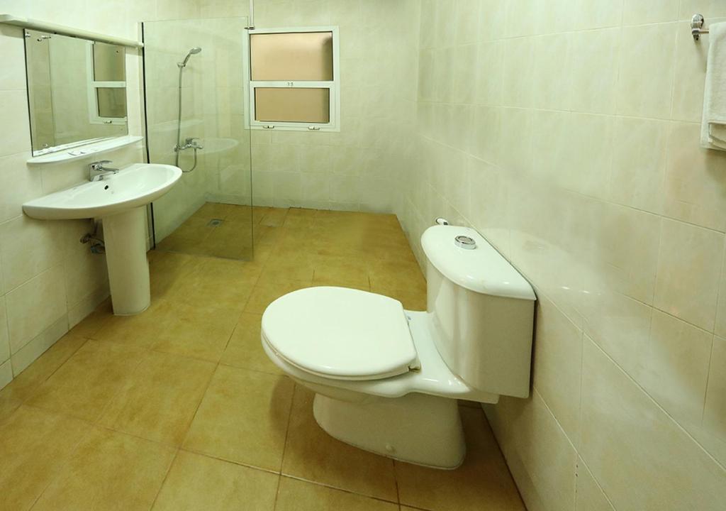 Koupelna v ubytování ltlalat Al Shorouq Hotel
