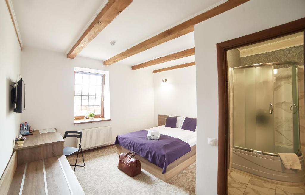 TV a/nebo společenská místnost v ubytování Coin Hotel