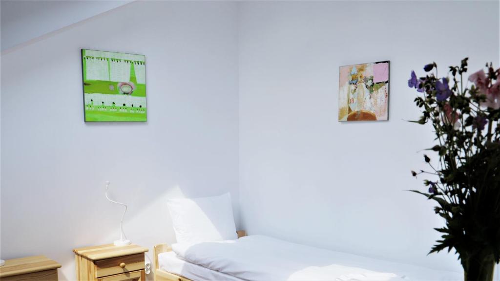 Łóżko lub łóżka w pokoju w obiekcie ArtRooms Pokoje Gościnne