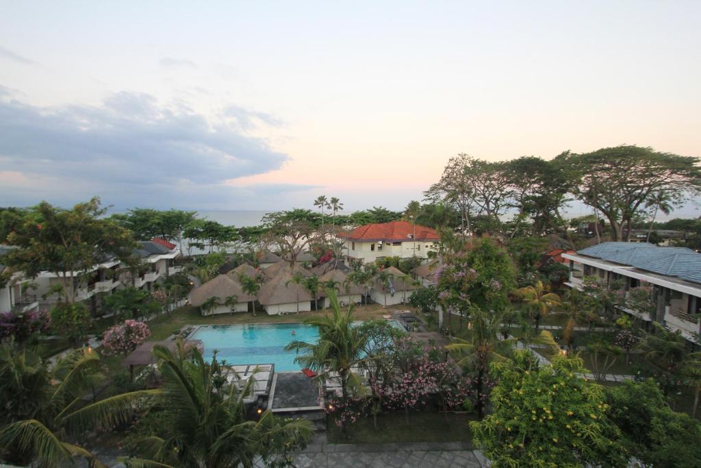 an aerial view of a resort with a swimming pool at Alit Beach Resort and Villas in Sanur