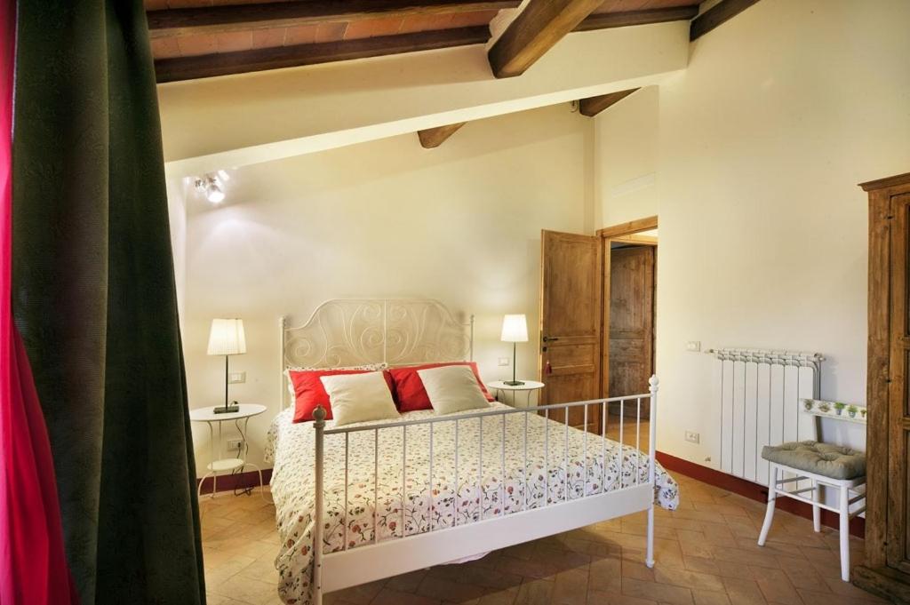 A bed or beds in a room at Bosco Ai Marzi