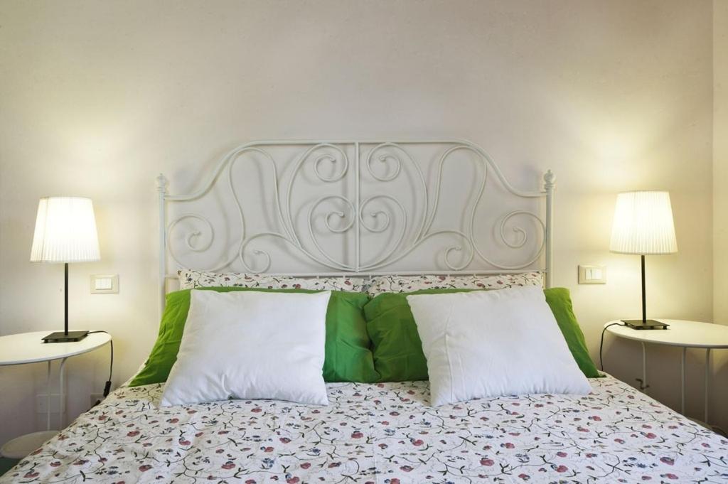 A bed or beds in a room at Bosco Ai Marzi
