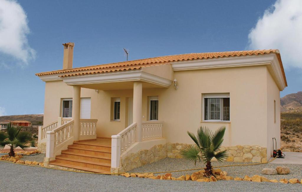 a house with a staircase in front of it at Amazing Home In Monnegre With 3 Bedrooms in Monnegre de Arriba
