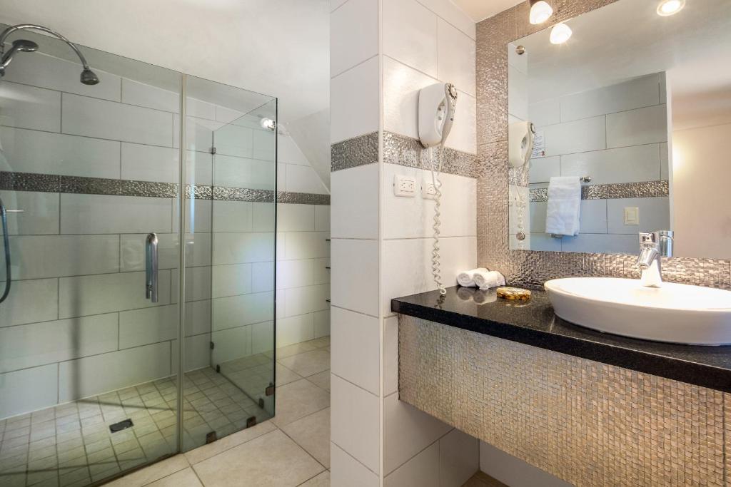 Koupelna v ubytování Hotel Villa Taina