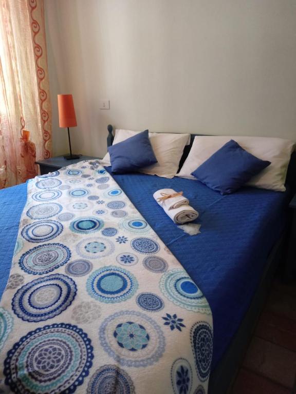 Postel nebo postele na pokoji v ubytování B&B La Dimora del Contadino