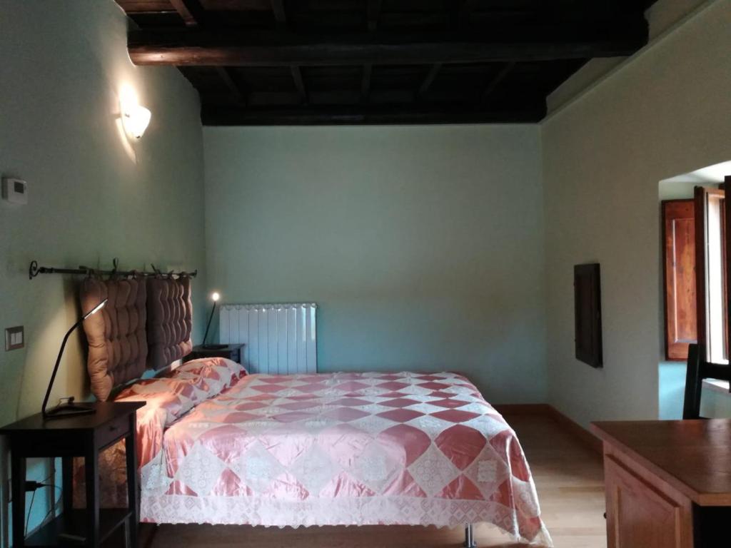 Postel nebo postele na pokoji v ubytování La Colombaia