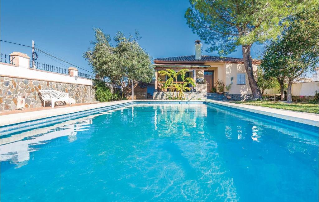 a swimming pool with a playground in a house at Nice Home In Arcos De La Frontera With Swimming Pool in Arcos de la Frontera