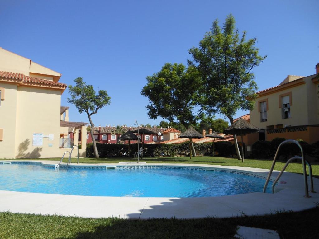 Πισίνα στο ή κοντά στο Casa Playa Islantilla Golf