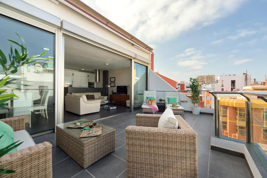 A seating area at Living Las Canteras Homes - LAS CANTERAS PENTHOUSE