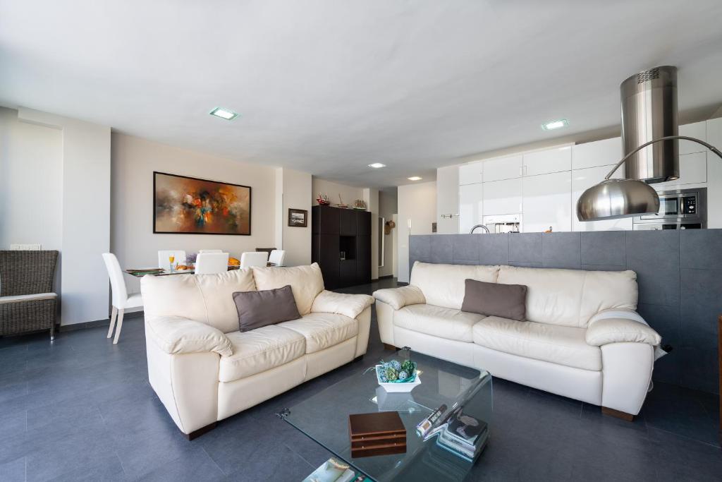 A seating area at Living Las Canteras Homes - LAS CANTERAS PENTHOUSE