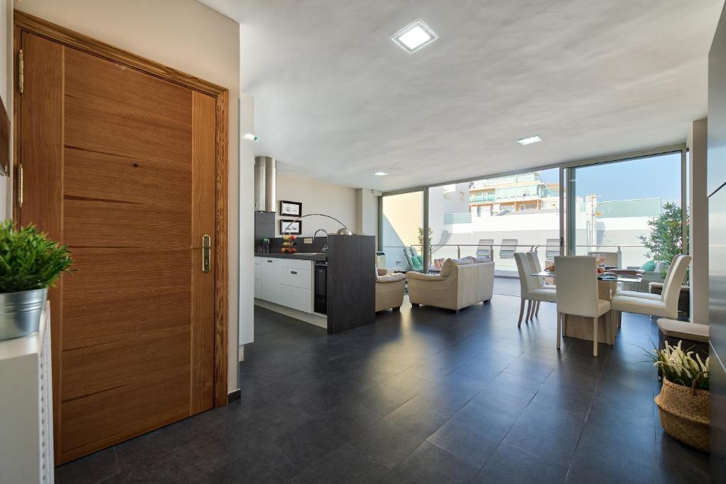 A seating area at Living Las Canteras Homes - LAS CANTERAS PENTHOUSE