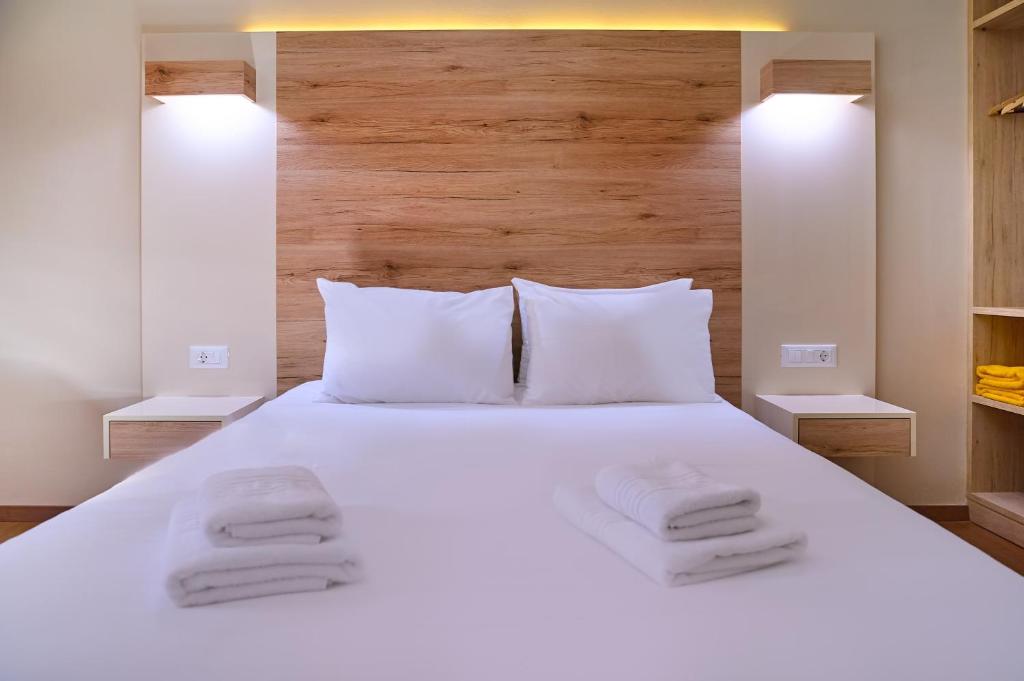 Posteľ alebo postele v izbe v ubytovaní Emmanouela's Apts
