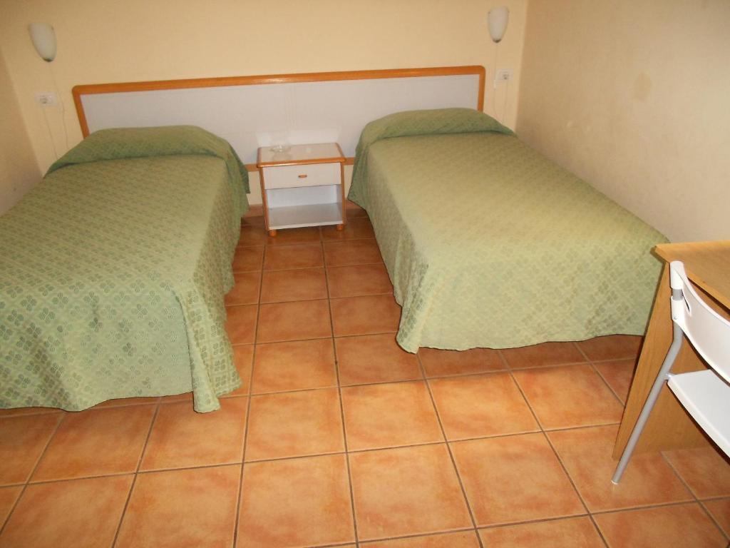 Postel nebo postele na pokoji v ubytování Pension Mova