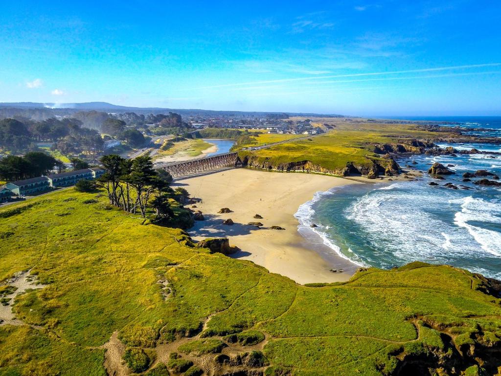 an aerial view of a beach and the ocean at Beachcomber Motel in Fort Bragg