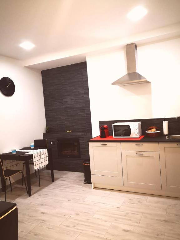 A kitchen or kitchenette at The Royals