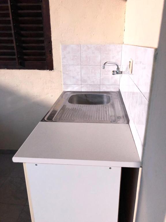 Kuchyň nebo kuchyňský kout v ubytování Apartments Vretenicic