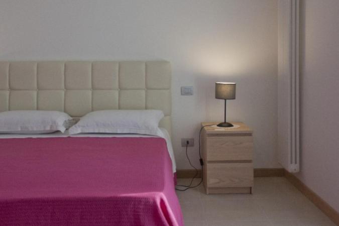 Łóżko lub łóżka w pokoju w obiekcie Grotta Cilicia B&B