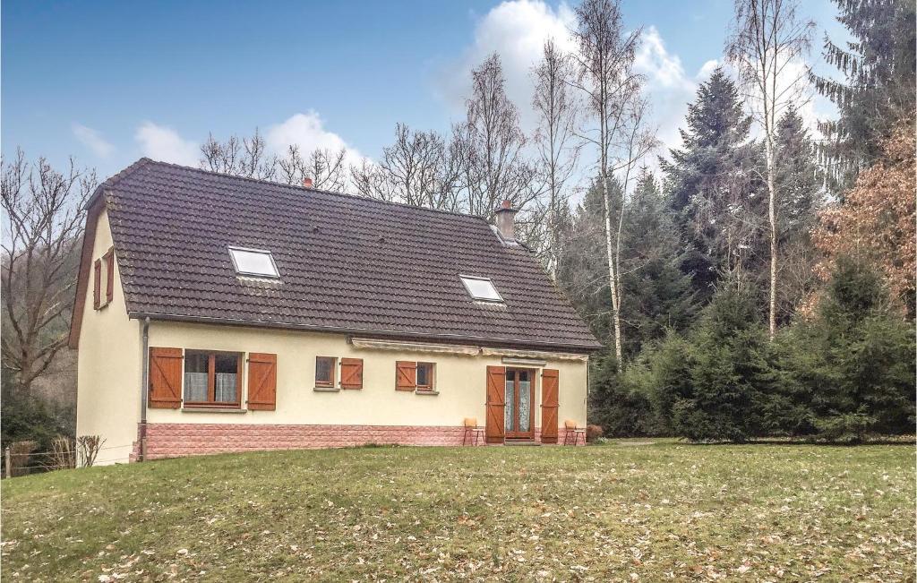 a small house on top of a green field at 6 Bedroom Beautiful Home In Dirbach in Dirbach