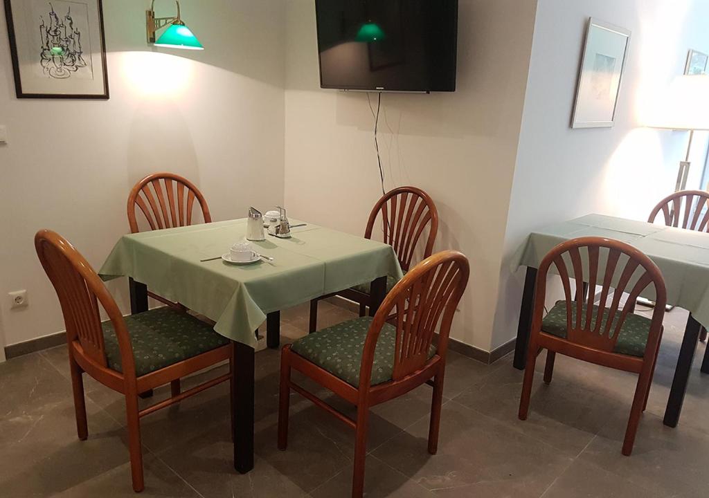 TV a/nebo společenská místnost v ubytování Comfort Rooms Bruckner