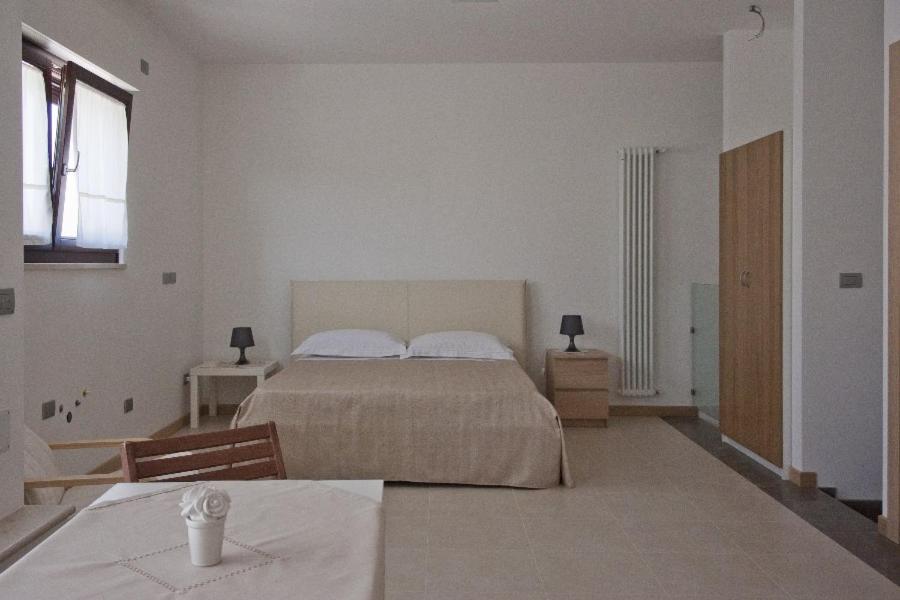 Łóżko lub łóżka w pokoju w obiekcie Grotta Cilicia B&B