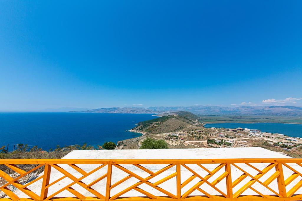a view of a body of water from a mountain at Santa Oliva Suites in Ksamil