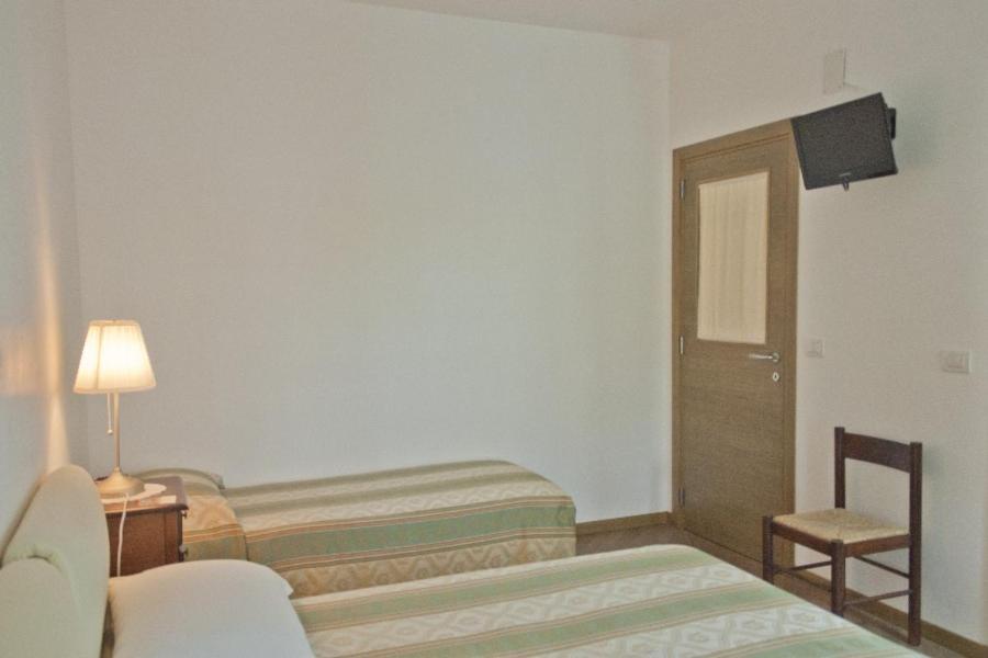 Łóżko lub łóżka w pokoju w obiekcie Grotta Cilicia B&B