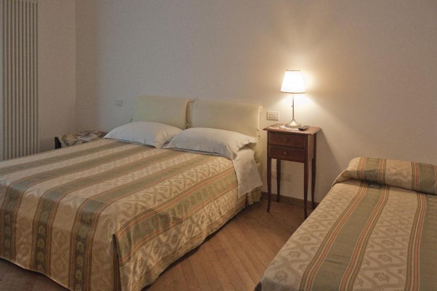 Łóżko lub łóżka w pokoju w obiekcie Grotta Cilicia B&B
