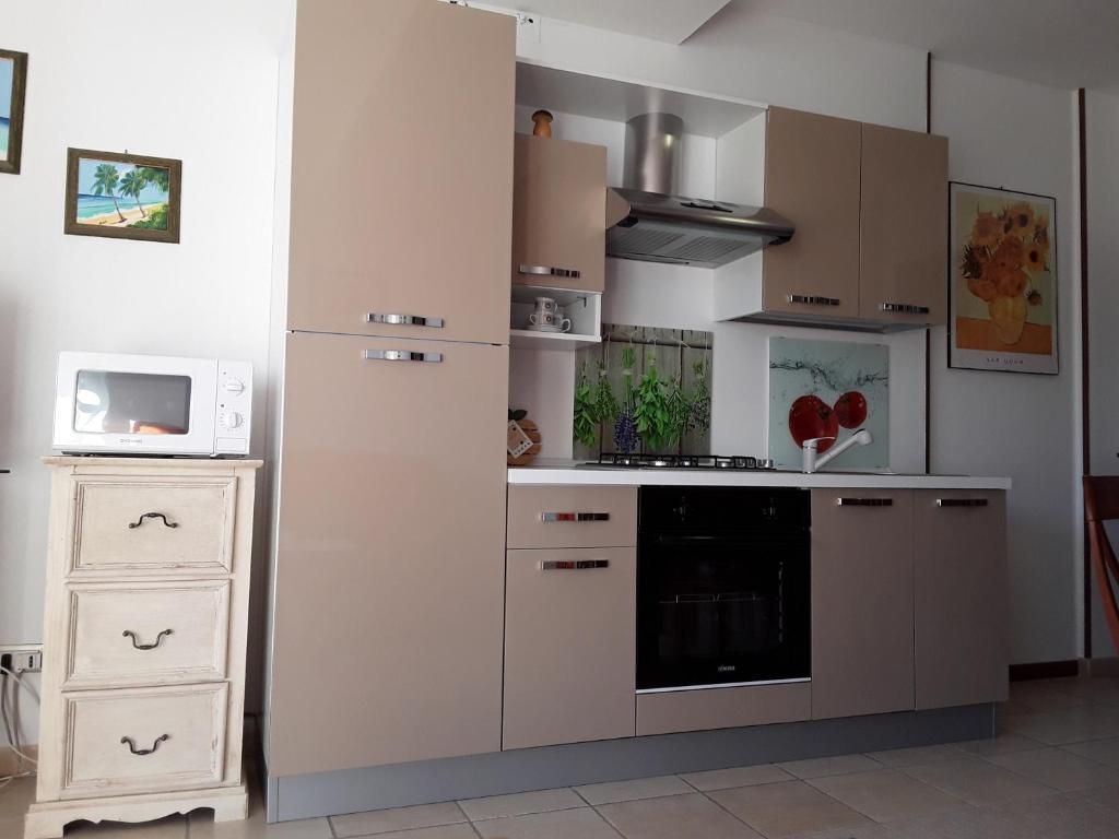 Kuchyň nebo kuchyňský kout v ubytování G&G1 Appartamento con giardino privato