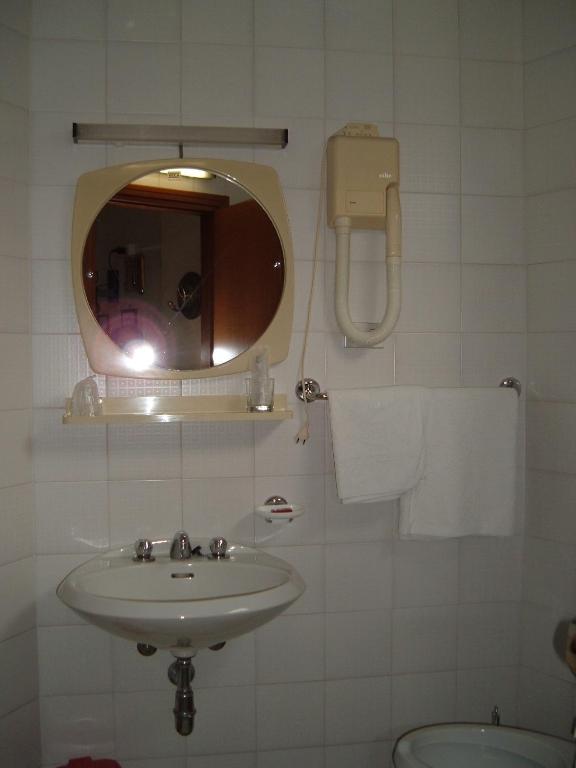 Koupelna v ubytování Albergo Luca
