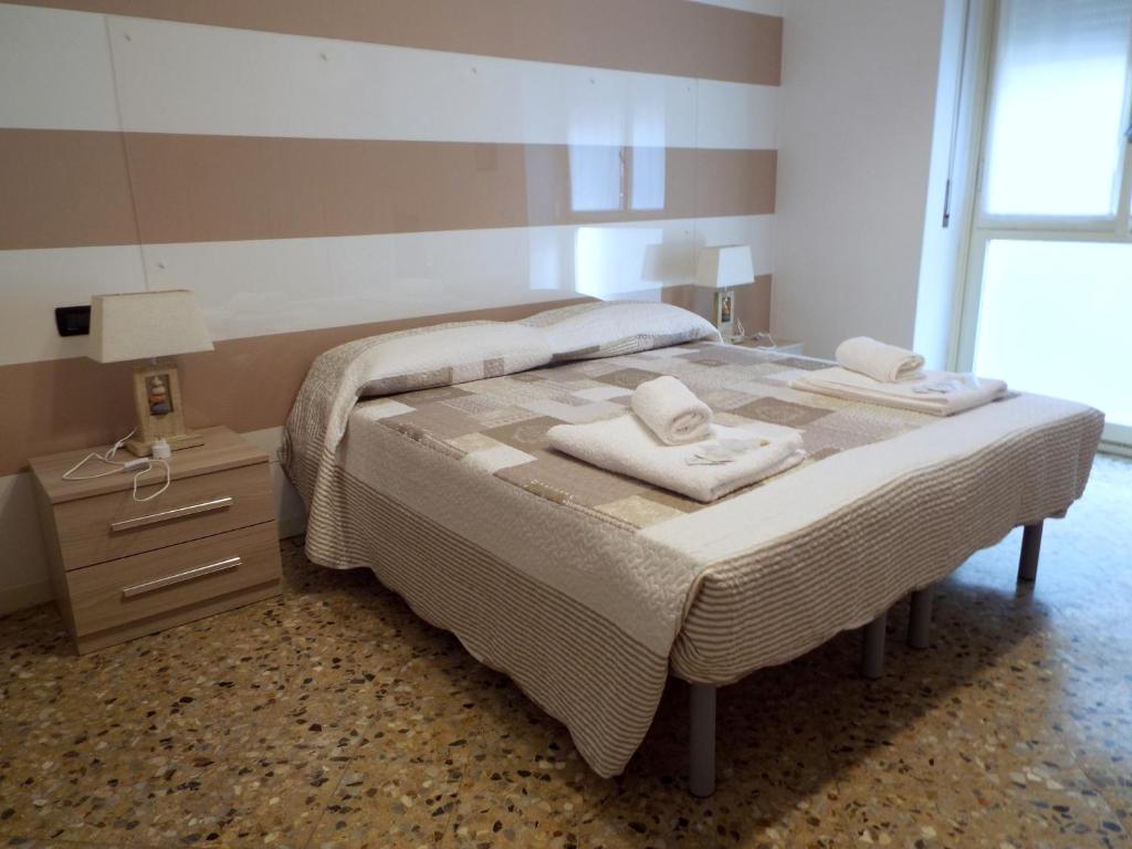 Ένα ή περισσότερα κρεβάτια σε δωμάτιο στο Lacaralele Apartment