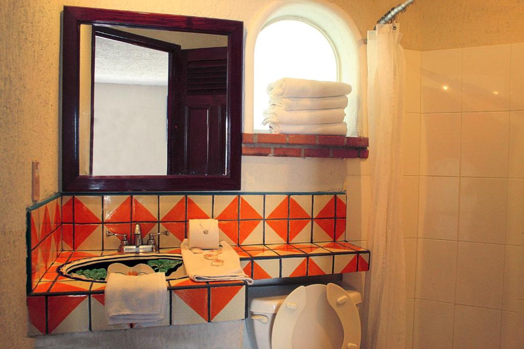 Koupelna v ubytování Hotel Rio Malecon