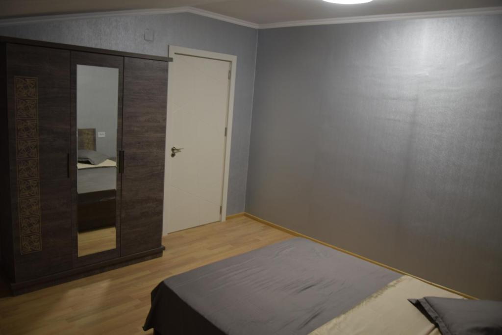 Postel nebo postele na pokoji v ubytování gogoli family hotel