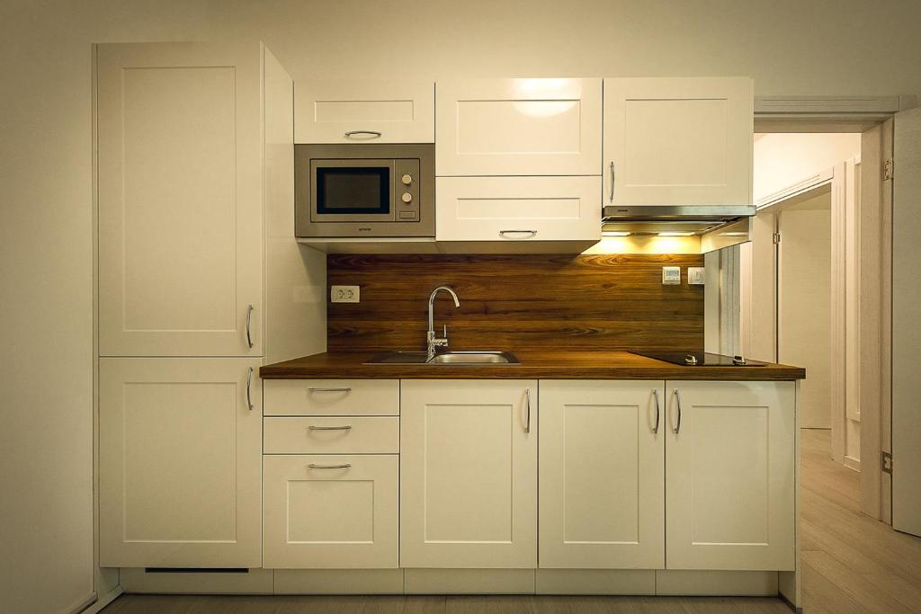 Kuchyň nebo kuchyňský kout v ubytování Adria lux apartmens 2