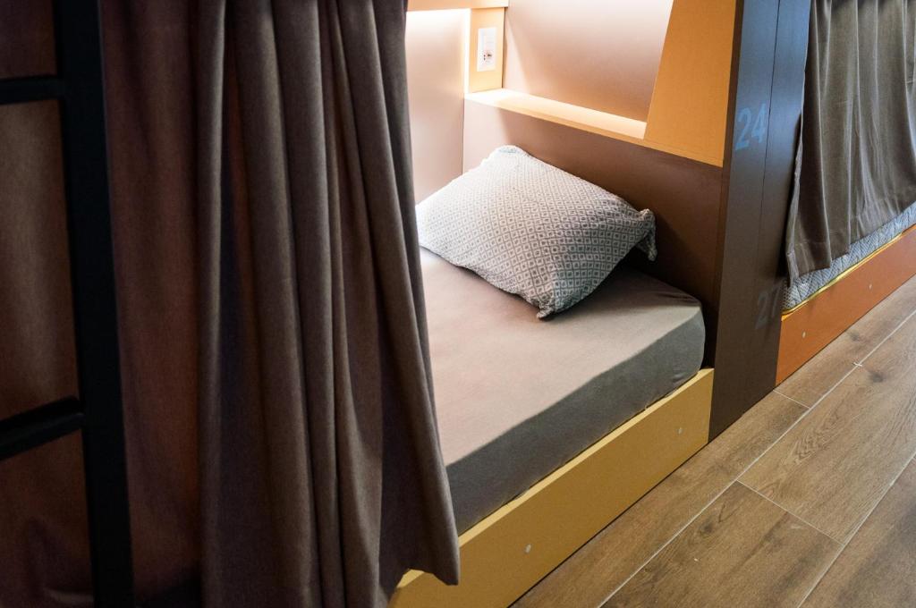 Postel nebo postele na pokoji v ubytování Ura Hostel